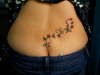 lower back tatz tattoo