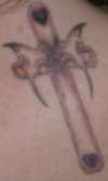 Butterfly Cross tattoo
