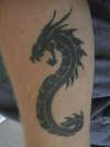 tribal dragon tattoo