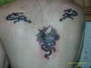 tribal dragons tattoo