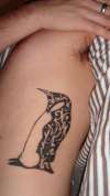 Tribal Penguin tattoo