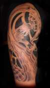 bio mechanical/abstract half sleeve tattoo