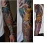 sleeve of koi, dragon and snake and flower tattoo