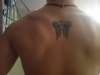 tribal wings tattoo