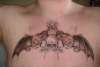 Skulls Wings Devil Dogs etc tattoo