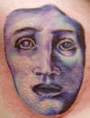 Medusa face tattoo