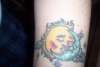 Sun & Moon Kissing tattoo