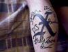 X tattoo