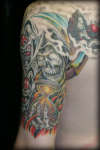 grim reaper/clown tattoo