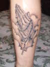 Praying hands tattoo