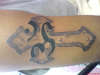 Cross And Aum tattoo