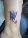 butterfly flower thingy tattoo