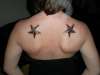 black and amber stars tattoo