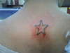 Debbies star on her back tattoo