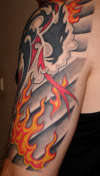 Dragon with flames, jap styling (rear shot) tattoo