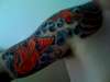 Koi with waves and kanji tattoo