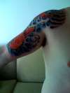 koi with waves and kanji tattoo