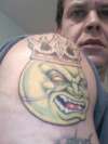 evil tennis ball tattoo