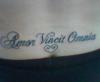 "Love conquers all" tattoo