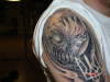 skull & ukranian symbol tattoo