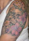 skull & flowers tattoo