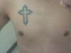 cross over chest tattoo