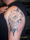 skull n tribal tattoo