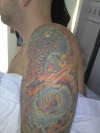 Dragon on Left sleeve tattoo
