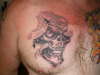 skull and snake tattoo