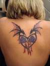 batwings heart tattoo