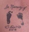 footprints tattoo