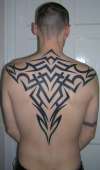 Tribal back piece tattoo