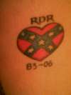 REBEL FLAG HEART ON MY CALF tattoo