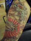 dragon head shot tattoo