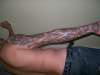 Backside of biomechanical tattoo