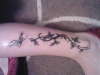 Black and grey butterfly tattoo