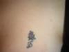 musical flower tattoo