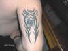 tribal black widow tattoo