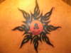 leo tribal sun tattoo