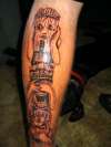 Tiki pole of hear no evil, see and speak no evil. tattoo