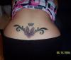 Lower back tat tattoo