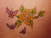 flower and butterflies tattoo