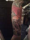 Koi left arm sleee tattoo