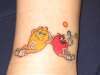 Red and Yellow m&m tattoo