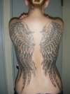 completed wings tattoo