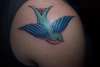 Bird tattoo I now added floral work to it. tattoo