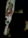 left leg tattoo