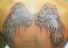 Dark Angel Wings Proove She's a Saint in a Sinners Skin tattoo