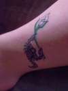 Scorpion with calla lilly tattoo