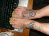 Hippie feet tattoo